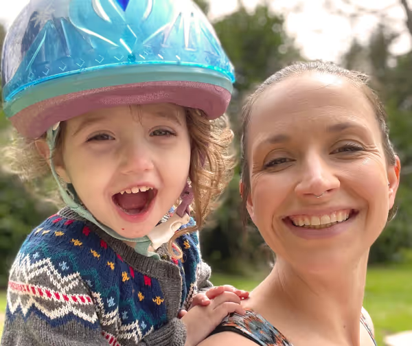 Kelsey and her daughter Penelope, who is being treated for SBS with GATTEX, smiling